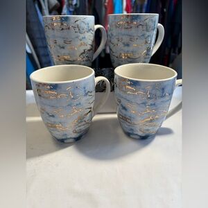 A Set of 4 American Atelier Blue and Gold Artistic 4” Coffee Mugs.